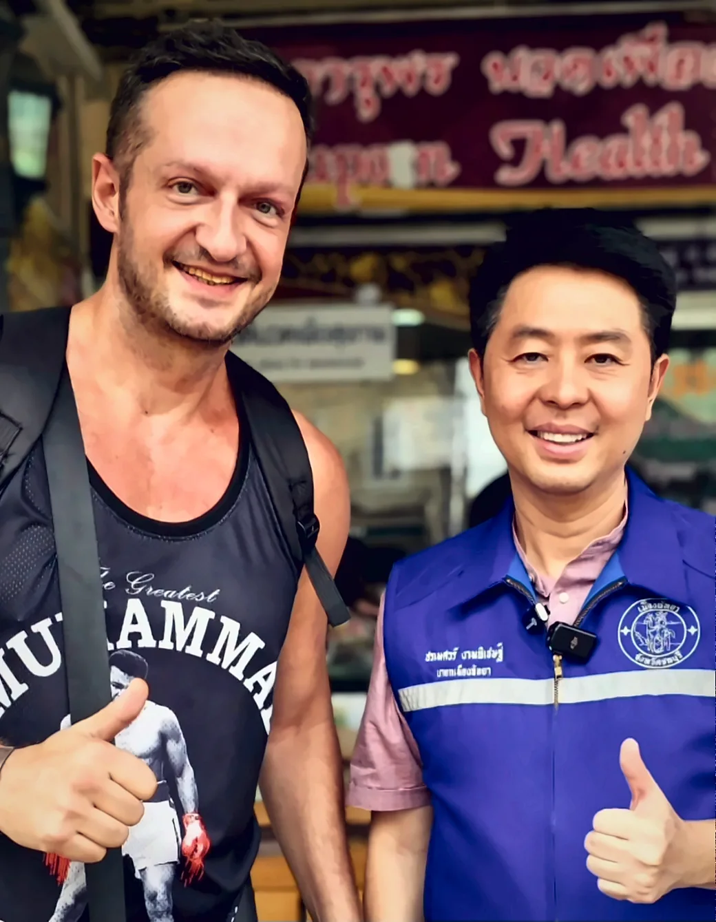 Yannis Pagiannidis and the Mayor of Pattaya City, both smiling with a thumbs up