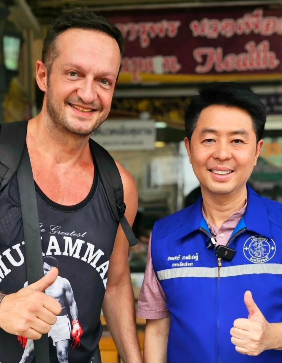 Yannis Pagiannidis and the Mayor of Pattaya City, both smiling with a thumbs up